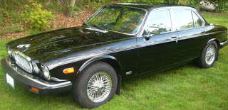 Black 1980 Jaguar XJ6 with wire wheels