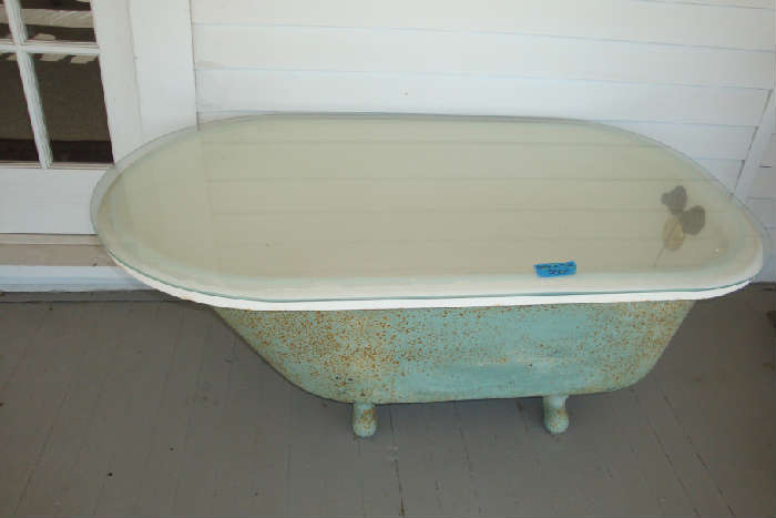 Clawfoot tub coffee table!!  Has thick glass on top