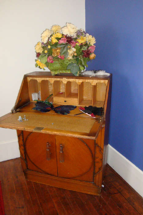 Antique slant top desk with carved tassel handles