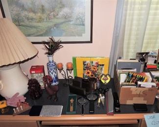 office supplies, pens, magnifiers, markers, pads