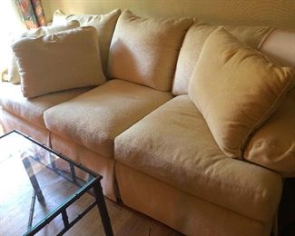 big comfy sofa -- white upholstery, I saw on Trading Spaces you can dye this with packets of Koolaid
