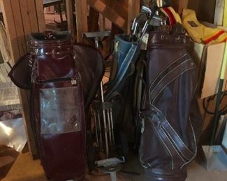 a bunch of golf clubs