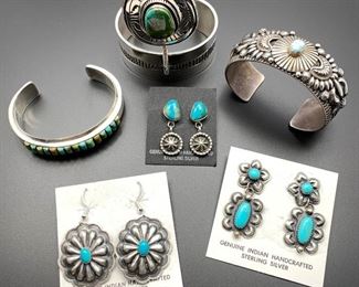 Beautiful sterling silver and turquoise Navajo jewelry, 50% off. The large cuff on the right has a Dry Creek turquoise accent and fabulous workmanship. The cuff bracelet at the top center has already sold.
