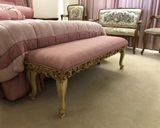 Vintage bench.  Professionally upholstered in pink moire. Carved, gilt trim. A gorgeous example of Hollywood Regency extravagance. 