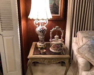 Beveled glass accent table. Queen and legs. Carved apron with shell centerpiece.