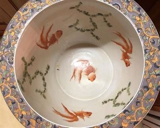 Classic Chinese floral design fishbowl and stand. 