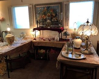 An exceptionally large collection of crystal bowls, trays, vases, footed bonbon, and serving pieces.