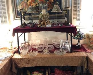 An exceptionally large collection of crystal bowls, trays, vases, footed bonbon, and serving pieces.