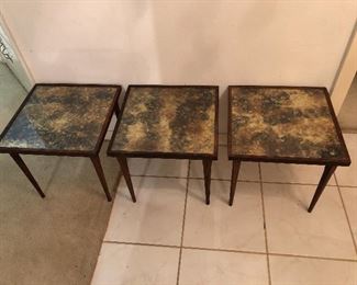 Set of three Mid Century Modern cocktail tables.