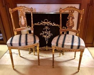 Louis the XVI style guilt chairs. Classic lines, visually interesting. The ultimate example of French refinement and sophistication.