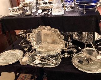 And array of silver plated items. Trays, bowls, serving pieces, water jugs, punch ladles, baskets, tiered serving pieces, goblets, casseroles, cake trays, more. 