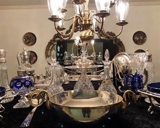 And array of silver plated items. Trays, bowls, serving pieces, water jugs, punch ladles, baskets, tiered serving pieces, goblets, casseroles, cake trays, more. 