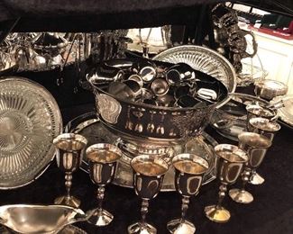 Silver plated punch bowl, underplate, and cups. Silver plated goblets. 
