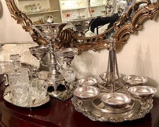 And array of silver plated items. Trays, bowls, serving pieces, water jugs, punch ladles, baskets, tiered serving pieces, goblets, casseroles, cake trays, more. 