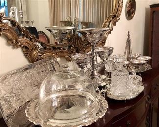 And array of silver plated items. Trays, bowls, serving pieces, water jugs, punch ladles, baskets, tiered serving pieces, goblets, casseroles, cake trays, more. 