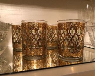 Culver “Valencia” Mid Century Modern double rocks. 22 KT gold Baroque design /green diamonds. Like new condition.