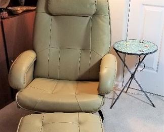 Very comfortable like new leather chair and stool. 