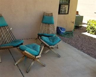 Vintage outdoor chairs and matching footstools. You don't see these everyday.