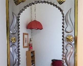 Silver and Gold metal mirror.