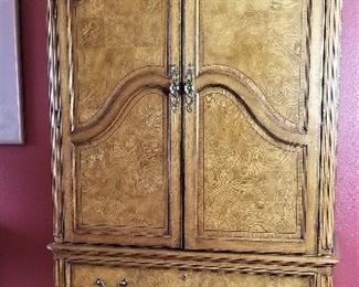 Beautiful Armoire matching the 4 poster bed great for TV or Storage.