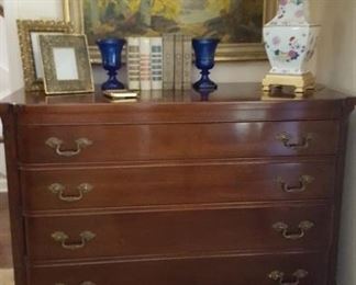 Matching mahogany four drawer chest with Asian inspired lamp