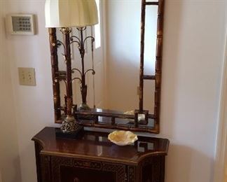 Faux bamboo mirror and handpainted cabinet