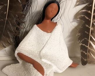 Pottery figure of Native American woman