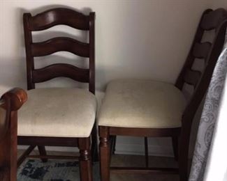 two counter stools, matches table seat is 24"