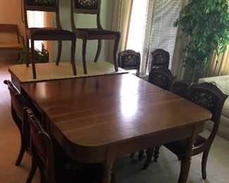 solid cherry table. So versatile- can remove side pieces, to have a double drop table, can add side pieces as shown above, or can flip up both drop leaves to make an amazingly long table, 
