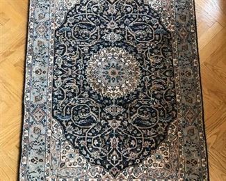 Black area rug (80% wool 20% cotton) 3' 3" X 4' 10" 