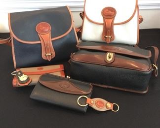 Various Dooney & Bourke All-Weather Leather purses, wallets and keychains