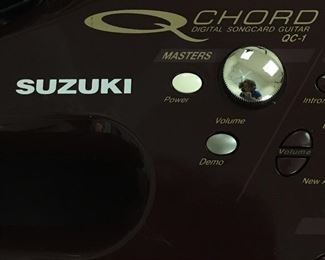 Suzuki QChord digital guitar