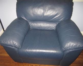 PAIR OF MATCHING LEATHER CHAIRS AND ONE OTTTOMAN