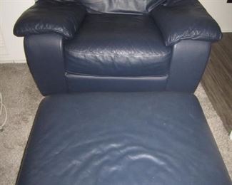 PAIR OF MATCHING LEATHER CHAIRS AND ONE OTTOMAN