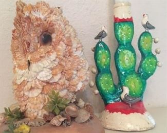 Owl sculpture made from sea shells, and one of two vintage cactus candlesticks from Mexico