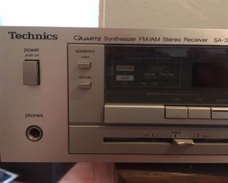 Quartz synthesizer FM/AM stereo receiver, Model SA-310 by Technics, with manual