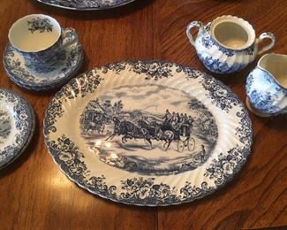 Ironstone platter, plates, cup and saucer, creamer and sugar in blue transferware, "Coaching Scene" by Johnson Bros., England