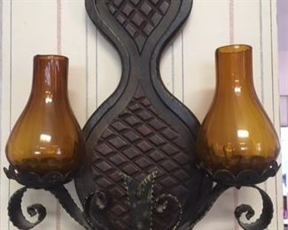 Wall sconce with amber glass shades