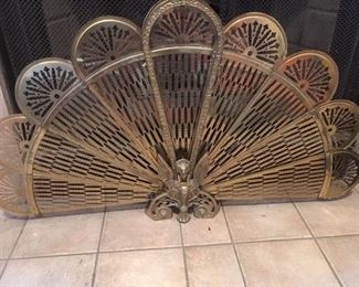 Brass fireplace fan with Phoenix motif