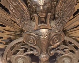 Detail of brass fireplace fan