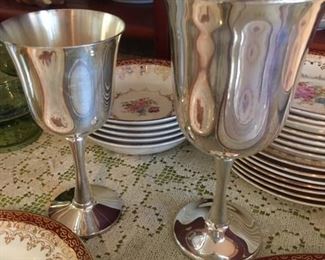 Shown is a pair yet there is a total service for 8 silver plated water & wine goblets, stamped Salem 