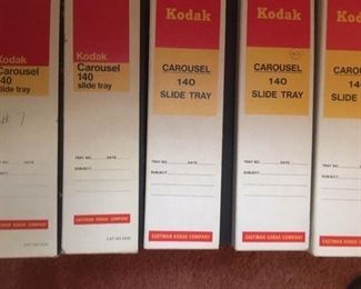 Numerous boxed carousel slide trays by Kodak