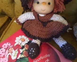 Strawberry Shortcake-style doll and Strawberry Shortcake coloring book