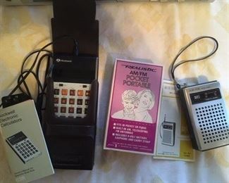 Rockwell electronic calculator with case and manual; Realistic AM/FM Pocket Portable Radio with manual