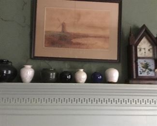 Antique watercolor, antique clock and NC pottery.