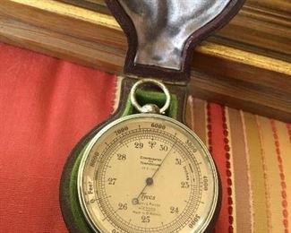 English compass, barometer, and other tools in a custom case