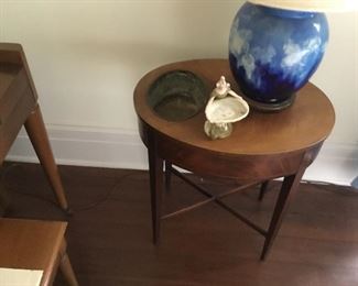 Unique side table with a planter insert