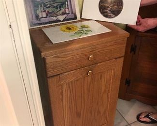 Amish oak cabinet with interchanging decorative tiles 