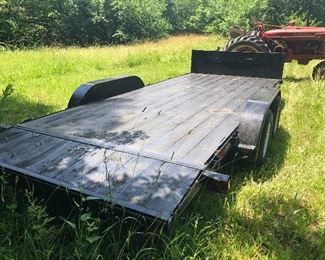 Large Trailer with new tires trailer cost $2000 and upgraded tires an additional $800.  7x18 foot  8 ply tires trailer is less than 2 years old. 7400 lb weight capacity.