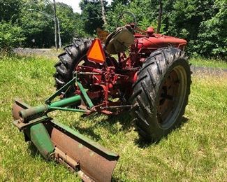 Farm tractor with plow International
Harvester McCormick